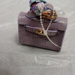 Miniature keychain or coin purse